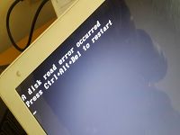 开机黑屏显示a disk read error occurred